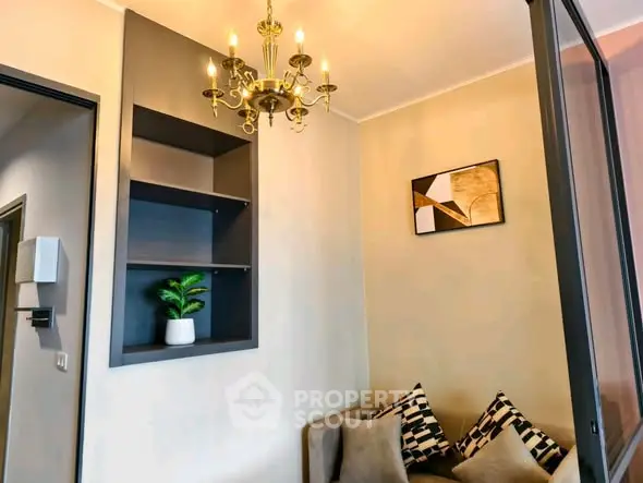 Cozy living room with elegant chandelier and modern decor