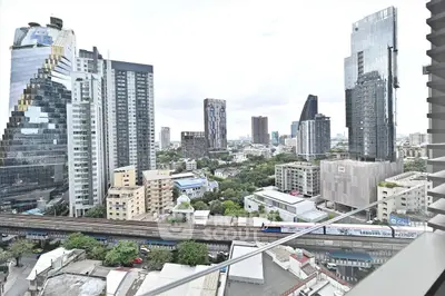 Stunning cityscape view from high-rise balcony in urban setting
