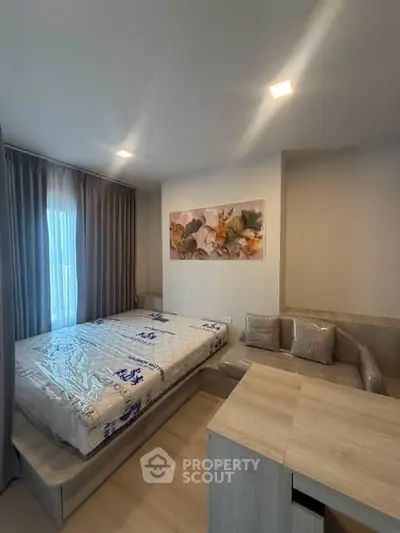 Modern bedroom with cozy decor and natural light
