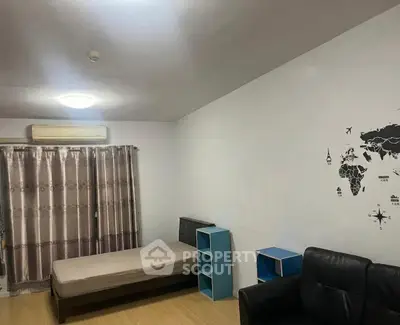 Spacious bedroom with minimalist decor and world map wall art