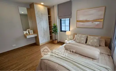 Cozy modern bedroom with elegant decor and natural light