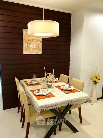 Elegant dining area with modern decor and stylish lighting
