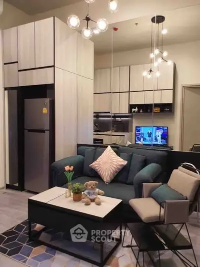 Modern open-layout living room with stylish kitchen and cozy seating area