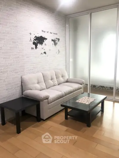 Modern living room with stylish sofa and world map wall decor