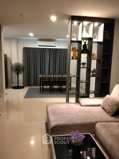 Spacious modern living room with elegant decor and open layout