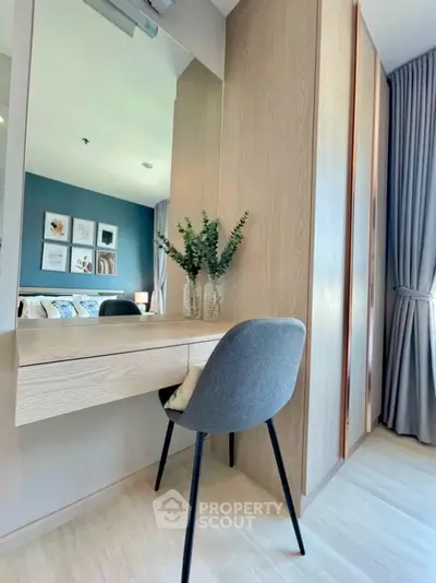 Chic bedroom with modern vanity and elegant decor in a stylish apartment