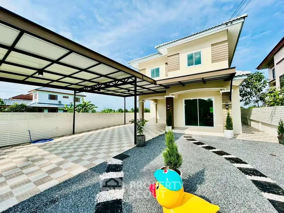 Charming two-story house with spacious driveway and modern exterior design.