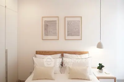 Elegant bedroom with minimalist decor and cozy ambiance