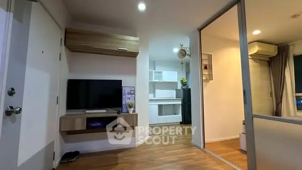 Modern apartment interior with wooden flooring and stylish decor