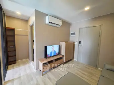 Modern living room with air conditioning and TV in stylish apartment