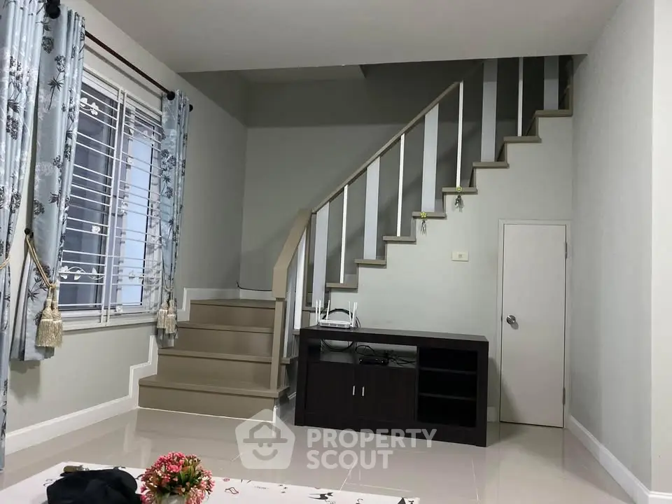 Modern interior with staircase and stylish decor, perfect for contemporary living