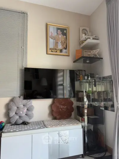 Cozy living room with modern decor and stylish shelving unit