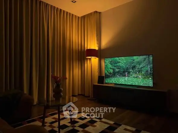 Cozy living room with ambient lighting and modern TV setup