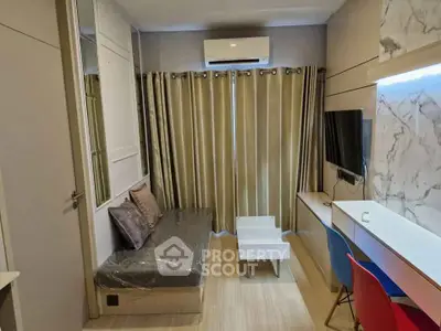 Modern compact living room with stylish furniture and air conditioning