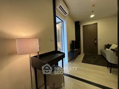 Modern apartment entrance with stylish decor and cozy lighting