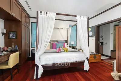 Luxurious bedroom with elegant four-poster bed and vibrant decor