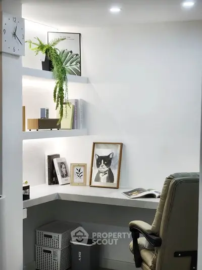 Modern study nook with sleek desk, shelves, and stylish decor