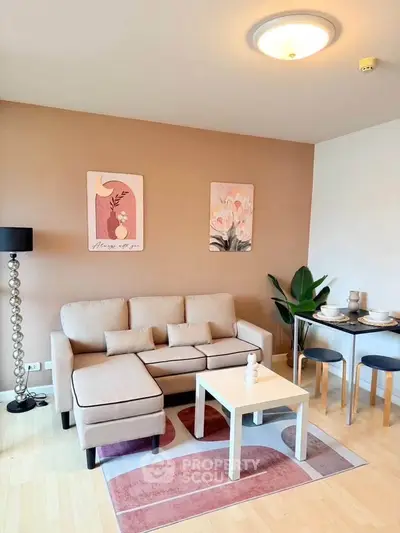 Stylish living room with modern decor and cozy dining area, perfect for urban living.