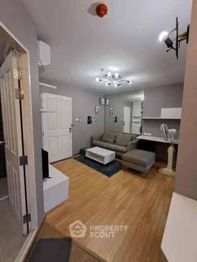 Modern living room with stylish decor and cozy seating area