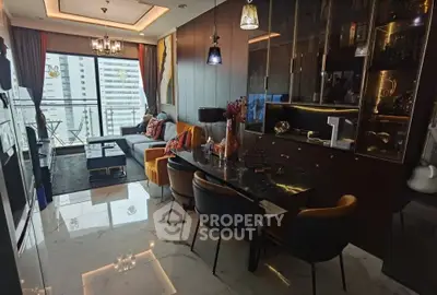 Luxurious modern living room with elegant dining area and city view balcony.