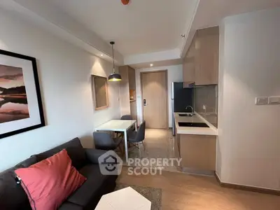 Modern living room with open kitchen layout in stylish apartment