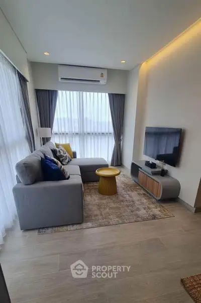 Modern living room with stylish decor and natural light