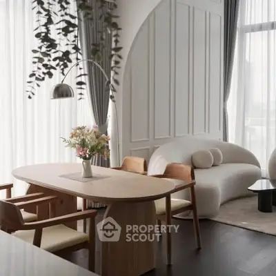 Elegant modern living room with stylish furniture and natural light