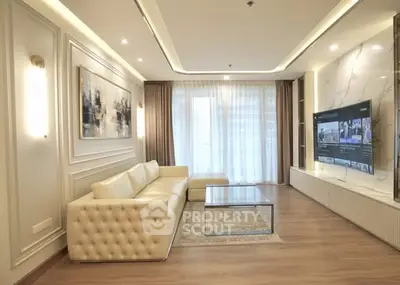 Luxurious living room with elegant decor and large TV