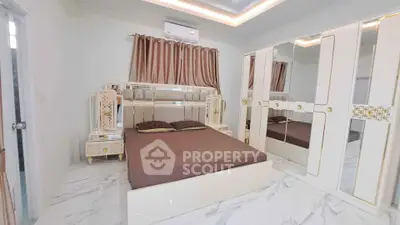 Luxurious bedroom with elegant decor and mirrored wardrobe in modern apartment
