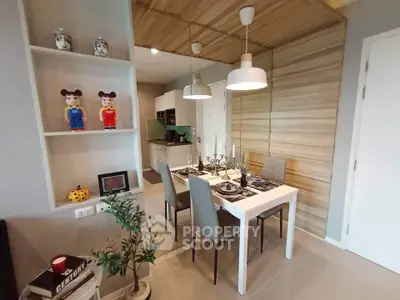 Modern dining area with stylish decor and open kitchen layout