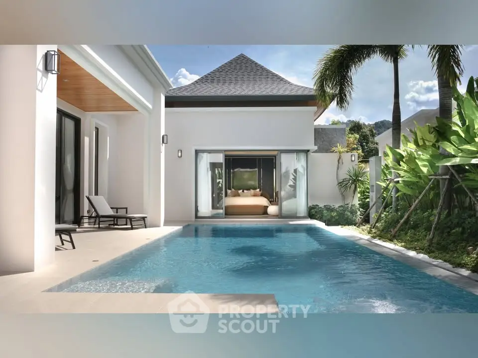 Luxurious villa with private pool and lush garden, perfect for tropical living.