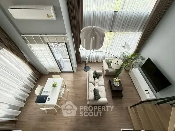 Stunning modern living room with high ceilings and elegant decor