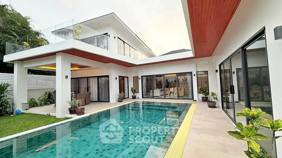 Luxurious modern villa with private pool and spacious terrace, perfect for relaxation and entertainment.