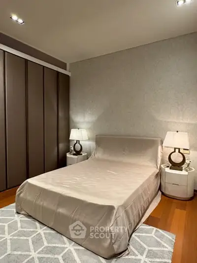 Luxurious bedroom with elegant lighting and modern decor