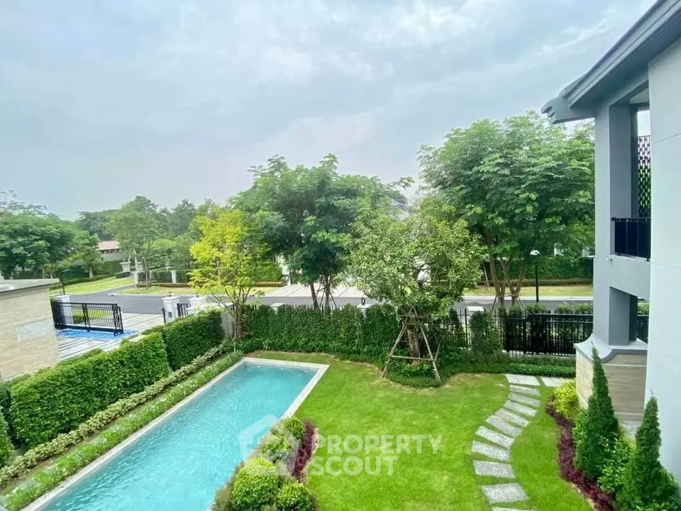 Luxurious property with private pool and lush garden view