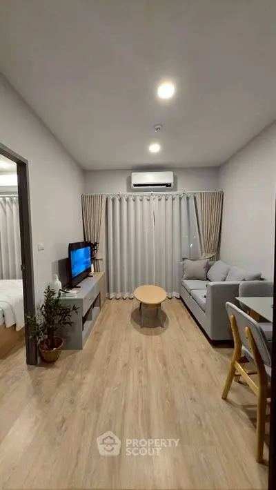 Modern living room with cozy sofa and stylish decor