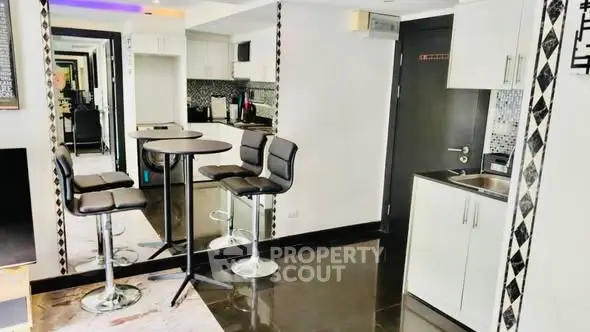 Modern kitchen with sleek design and stylish bar seating