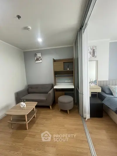Modern studio apartment with cozy living area and stylish decor