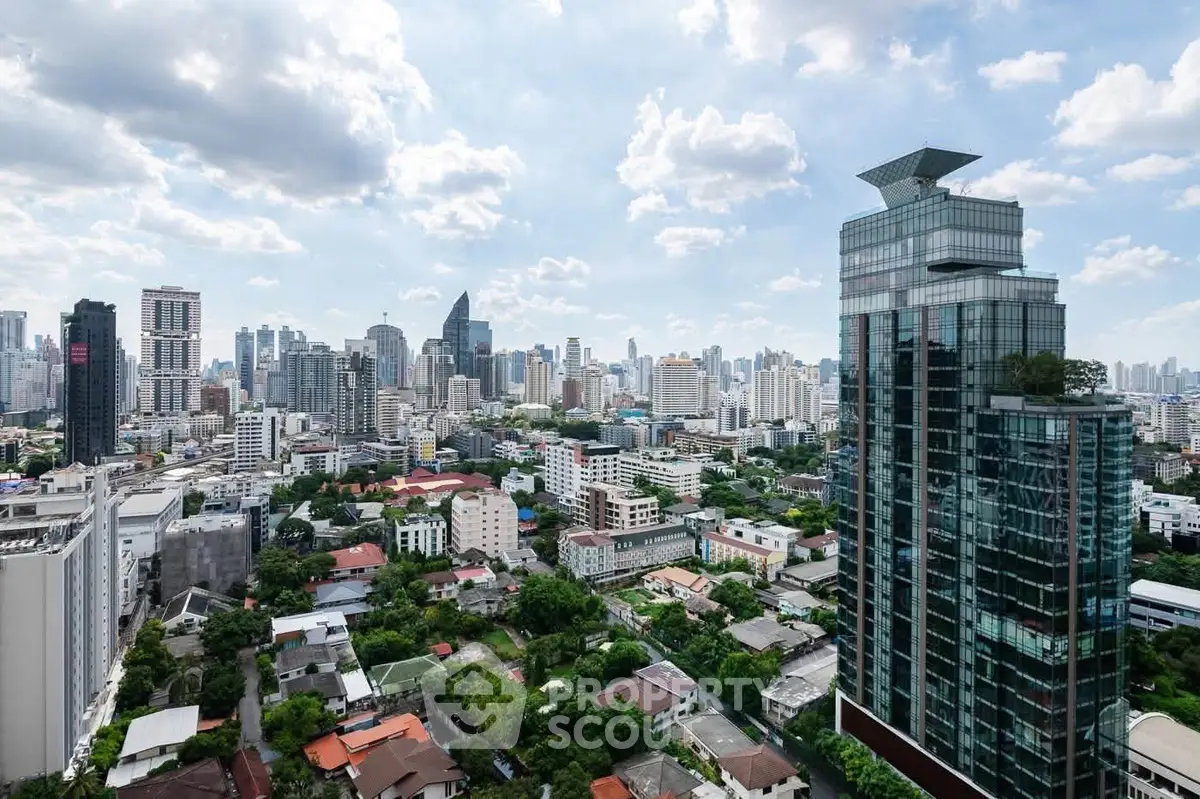 Stunning cityscape view showcasing modern skyscrapers and lush greenery, perfect for urban living enthusiasts.