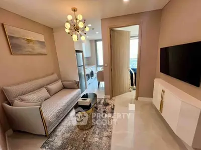 Modern living room with elegant decor and open kitchen layout