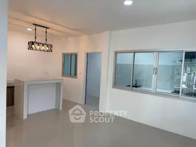 Modern open kitchen with sleek design and ample natural light