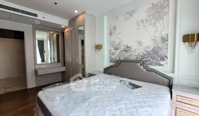Luxurious bedroom with elegant decor and stylish furnishings in modern apartment.