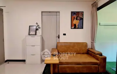 Stylish living room with leather sofa and modern decor