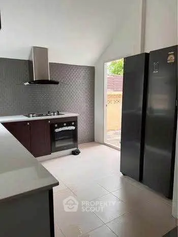 Modern kitchen with sleek appliances and open layout