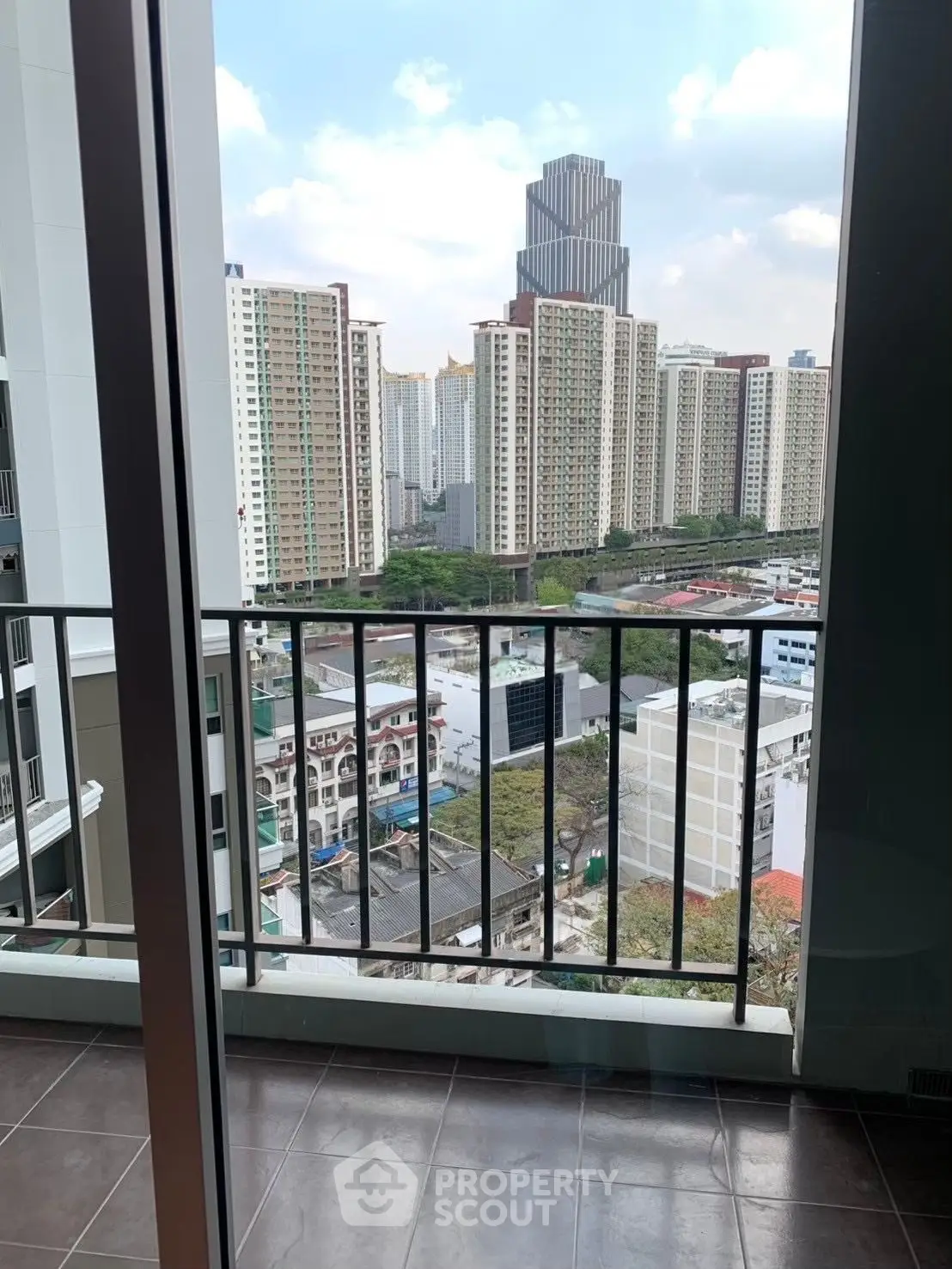 Stunning cityscape view from a modern apartment balcony, perfect for urban living enthusiasts.