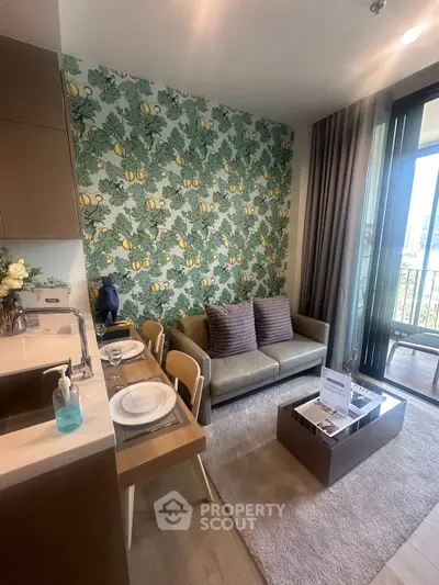 Chic living room with vibrant lemon wallpaper and cozy seating area, perfect for modern urban living.