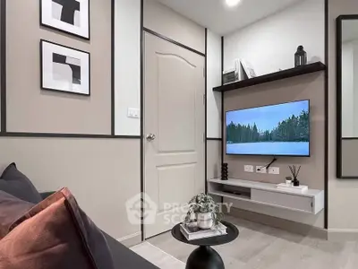 Modern living room with wall-mounted TV and stylish decor
