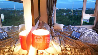 Luxurious bedroom with stunning city view and cozy bedding, perfect for relaxation and comfort.