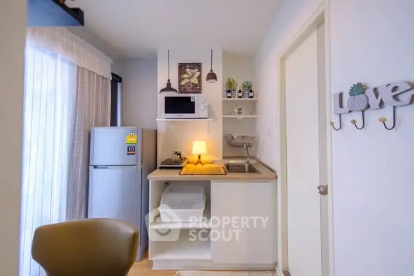 Cozy kitchen with modern appliances and stylish decor