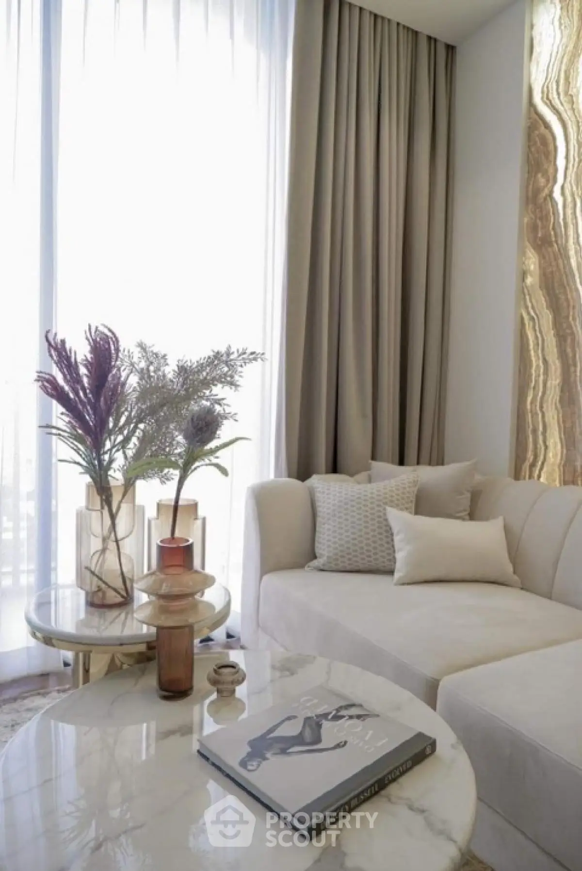 Luxurious modern living room with elegant decor and natural light